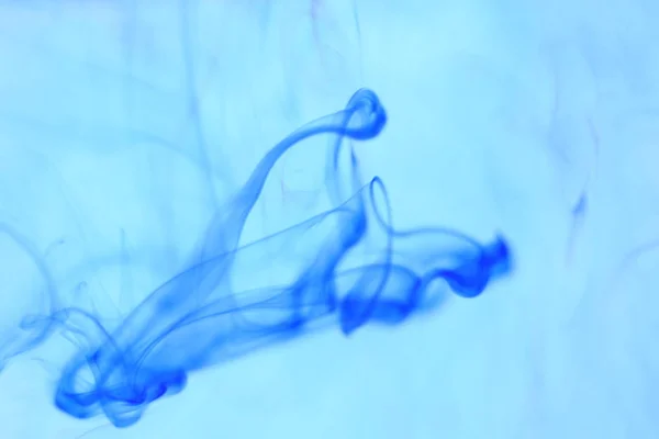 Blue Ambient Ink Motion. Artistic Water Drop Curves. Soft Background.