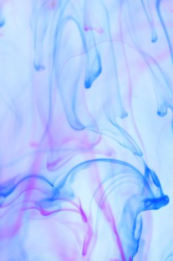 Renkli boya damla su dinamik hareket. Yumuşak ortam arka plan.