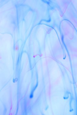 Renkli sualtı mürekkep dinamik lekeleri. Yumuşak ortam arka plan.