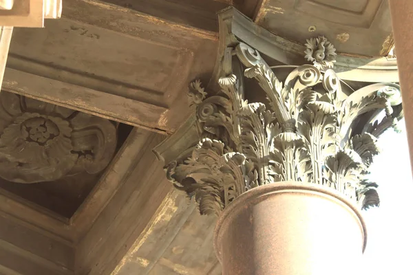 Isaac Cathedral pillar\'s top. Ancient flower ornaments.