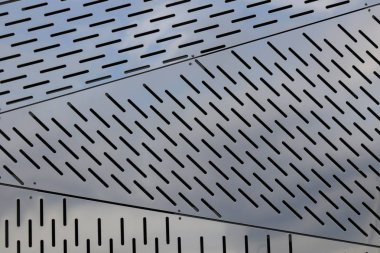 Çentikler doku hat metal şekillerle. Çelik üçgen arka plan.