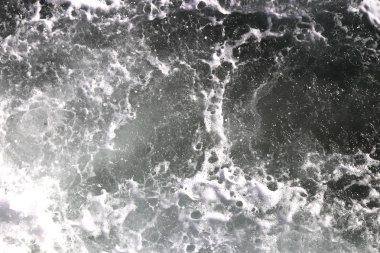 Deniz dalga köpüğü doku. Deniz aqua devinim yüzey arka plan. Açık su köpük zemin swirls.