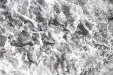 Açık su köpük zemin swirls. Deniz dalga köpüğü doku. Deniz aqua devinim yüzey arka plan.