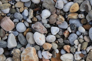 Deniz çakıl cobblestones doku. Deniz mineral güzellik uyum. Beach taş yüzey.