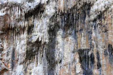 Sızıntı dikitler doku rock. Dağ desen arka plan.