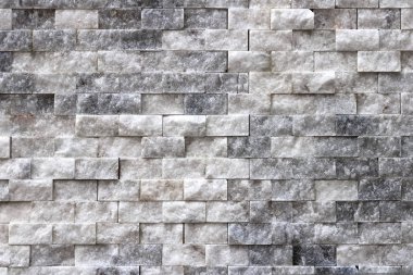 Kaymak gibi duvar duvar doku döşer. Beyaz taş iç arka plan.