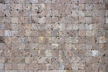 Kare taşlar arka plan yüzey. Traverten duvar kaplama duvar doku döşer.