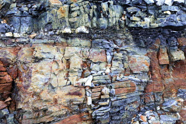 Layered rock texture. Mountain stone pattern background.