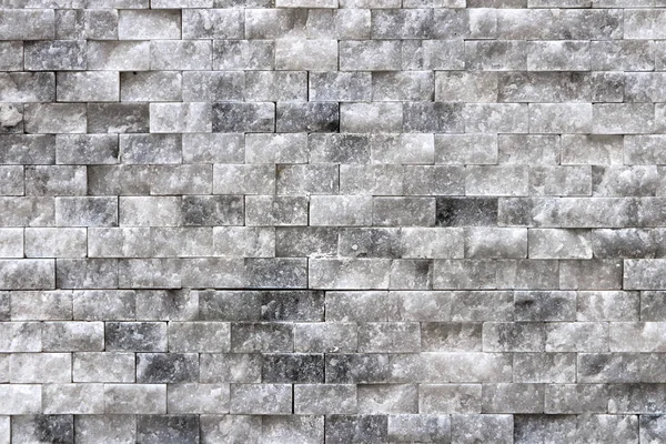 Kaymak gibi duvar kaplama duvar doku döşer. Beyaz taş yüzey iç arka plan.