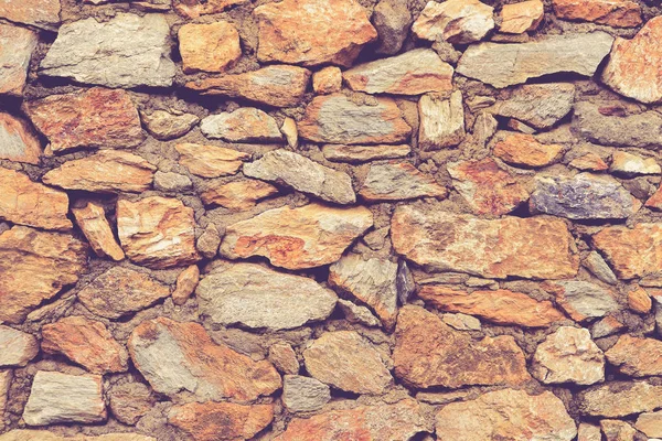 Kayalık duvar parke taşları duvar dokusu kaplama. Kaba taş ba — Stok fotoğraf