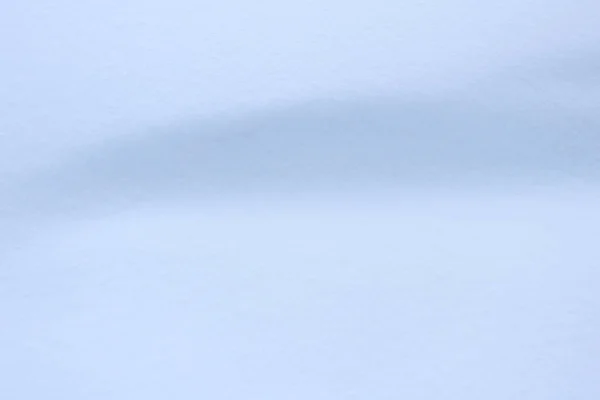 Снежный холм текстура. Зимний сугроб на фоне пейзажа. Мягкая поверхность снега . — стоковое фото