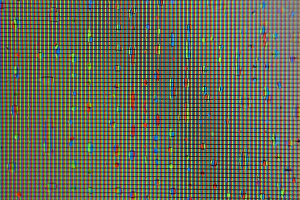 Voda klesá na pixilovaném povrchu. Zobrazí texturu mřížky v pixelech. Pozadí makra monitoru obrazových bodů. — Stock fotografie