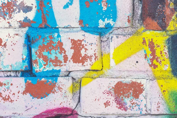 Eski boya yüzeyi. Soyut sokak sanatı deseni. Yıpranmış grafiti duvar arka plan. Grunge boyalı doku.