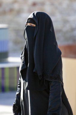 The niqab, is a long tunic that covers completely the body and the head. Scarcely it leaves to the overdraft the eyes of the woman. clipart
