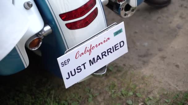 Just married sign number on motorbike — Stock Video