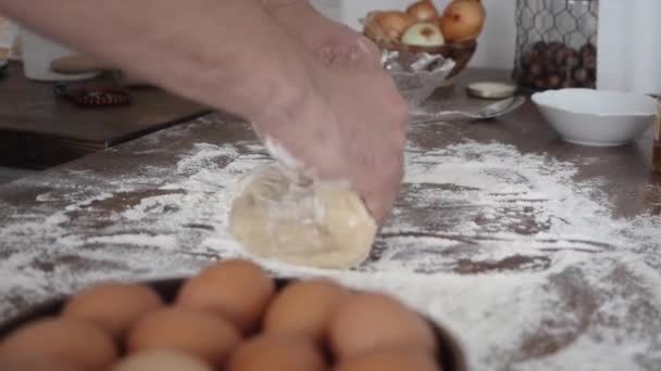 Cook kneads the dough with his hands — Stock Video