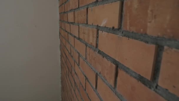 Newly built brown brick wall — Stock Video