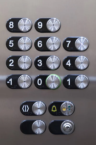 Close-up of the buttons on an elevator panel button