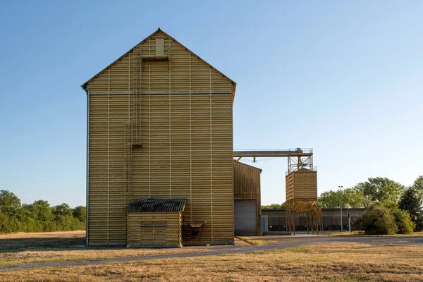 Warehouse and grain storage silo