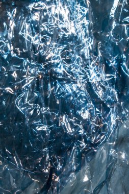 Plastik parlak bkz: soyut ışıltı ile katlanmış arka plan mavi