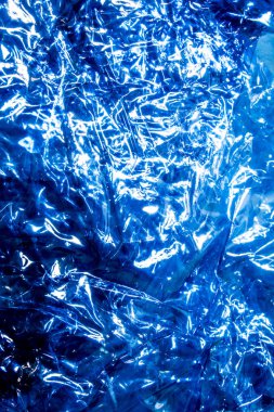 Plastik parlak bkz: soyut ışıltı ile katlanmış arka plan mavi
