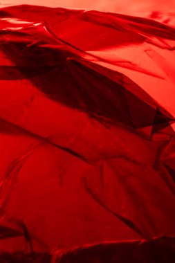 Plastik parlak bkz: soyut ışıltı ile katlanmış arka plan kırmızı