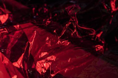 Plastik parlak bkz: soyut ışıltı ile katlanmış arka plan kırmızı