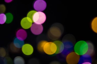 Glitter Bokeh konfeti siyah arka plan üzerine