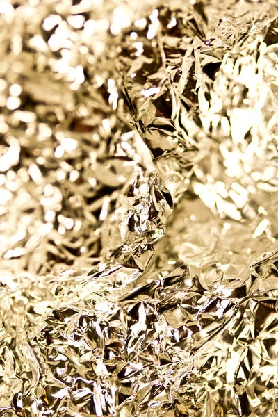 Close Up of Tin Metal Foil Holographic Abstract Background