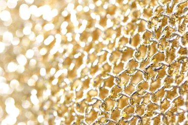 Yakın kadar olan altın kumaş zincir dikiş posta