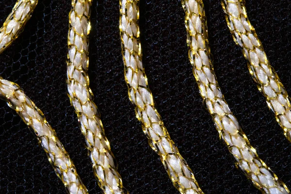 Gold Stitching lines on Black Background