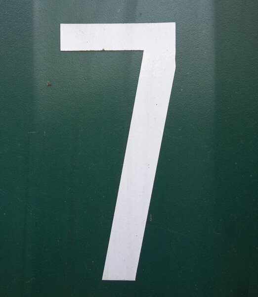 Written Wording in Distressed State Typography Found Number Seven 7 