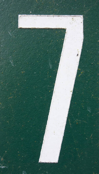 Written Wording in Distressed State Typography Found Number Seven 7 