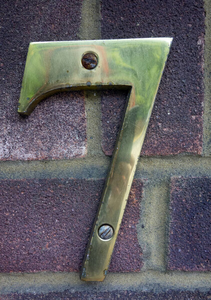 Written Wording in Distressed State Typography Found Number Seven 7 