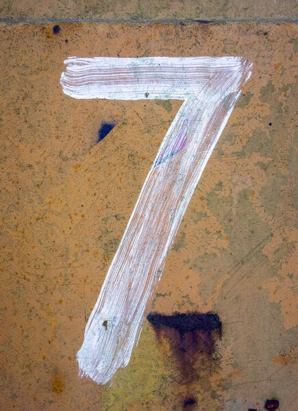 Written Wording in Distressed State Typography Found Number Seven 7 