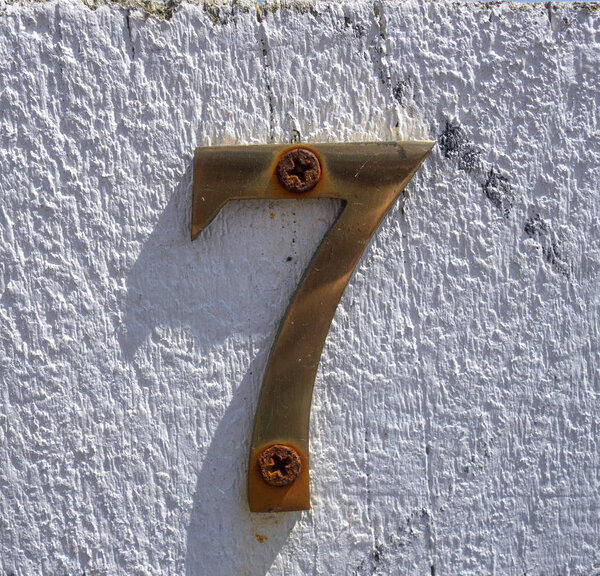 Written Wording in Distressed State Typography Found Number Seven 7 