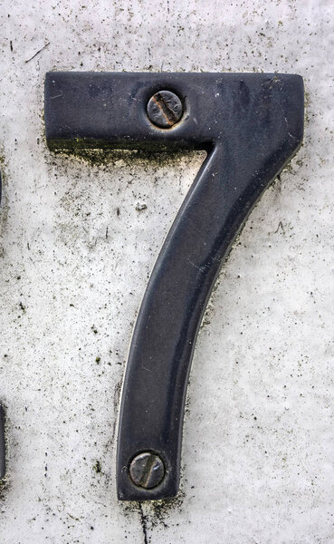 Written Wording in Distressed State Typography Found Number Seven 7 