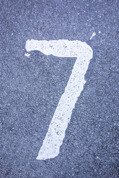 Written Wording in Distressed State Typography Found Number Seven 7 