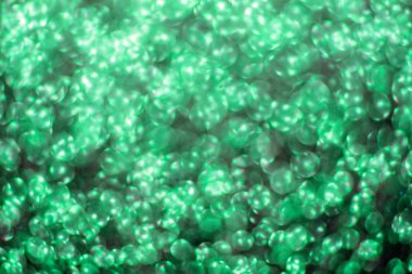 Arka Plan için Bokeh ile Yeşil Glitter Close Up