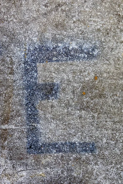 Written Wording in Distressed State Typography Found Letter E