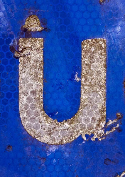 Written Wording in Distressed State Typography Found Letter U