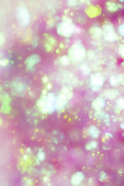 Pink Sparkling Glitter on White Background Bokeh Abstract Close Up