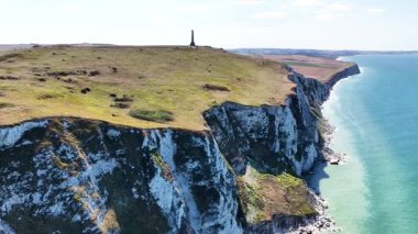 Experience the breathtaking aerial views of Cap Blanc Nez, a remarkable natural site in France. The video highlights the stunning cliffs and lush greenery, capturing this picturesque coastal area.