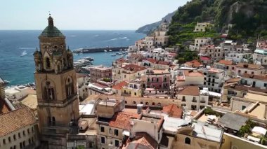 Discover the beauty of the Amalfi Coast with aerial views of stunning villages, crystal-clear waters, and picturesque landscapes that define this iconic Italian region.