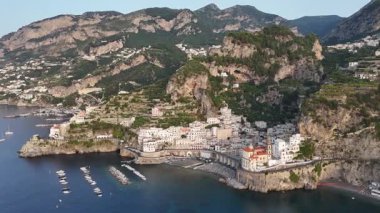 Experience the breathtaking beauty of the Amalfi Coast from above. Discover the picturesque villages, lush hills, and sparkling waters that create a perfect Italian getaway.