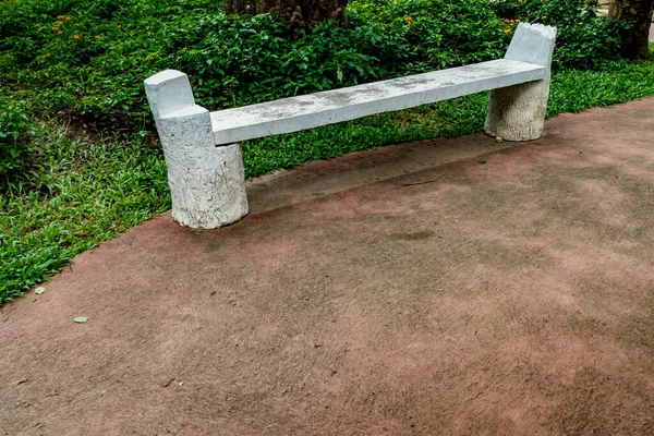 White Concrete bench in the park