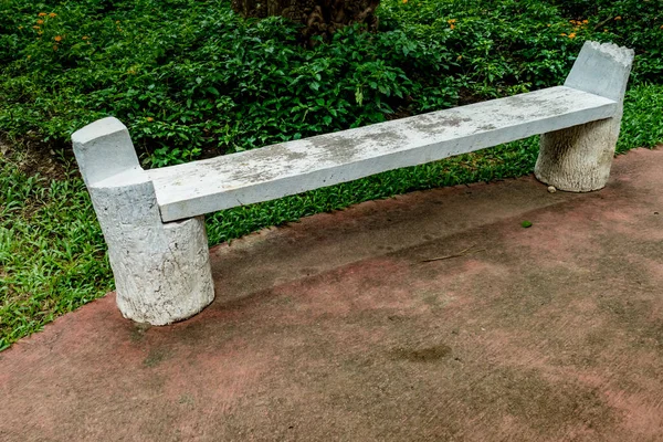 White Concrete bench in the park