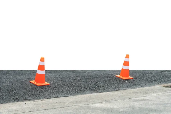 Plastic orange cone on the asphalt road isolate on white background with clipping path