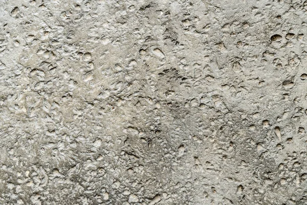 Nahaufnahme Von Zement Mit Kleiner Kiesstruktur lizenzfreie Stockbilder