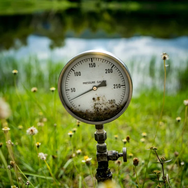 Water pressure gauge on green nature background — Stock Image Water Pressure Gauge Green Nature Background Stock Picture